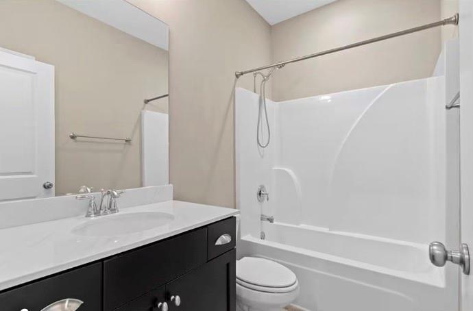 1063 Johnson Grove Atlanta, GA 30318 - Photo 20 of 23 a bathroom with a granite countertop sink a toilet and shower