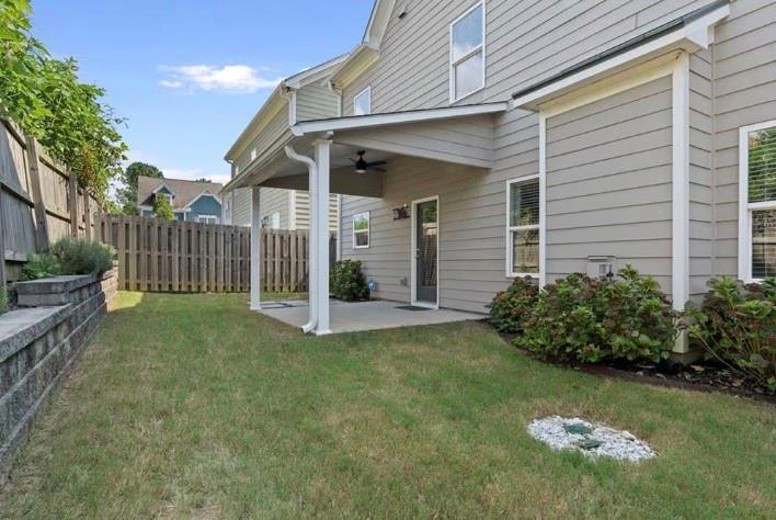 1063 Johnson Grove Atlanta, GA 30318 - Photo 23 of 23 a view of a house with a yard and plants