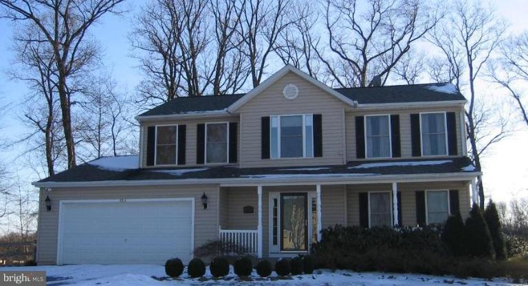2511 Fairmount Road Hampstead, MD 21074 - Photo 1 of 30 a front view of a house with yard and green space
