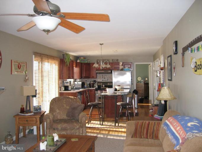 2511 Fairmount Road Hampstead, MD 21074 - Photo 28 of 30 a view of a dining room with furniture window and wooden floor
