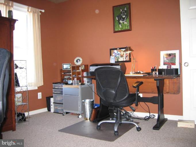 2511 Fairmount Road Hampstead, MD 21074 - Photo 14 of 30 a view of a workspace with furniture and a window