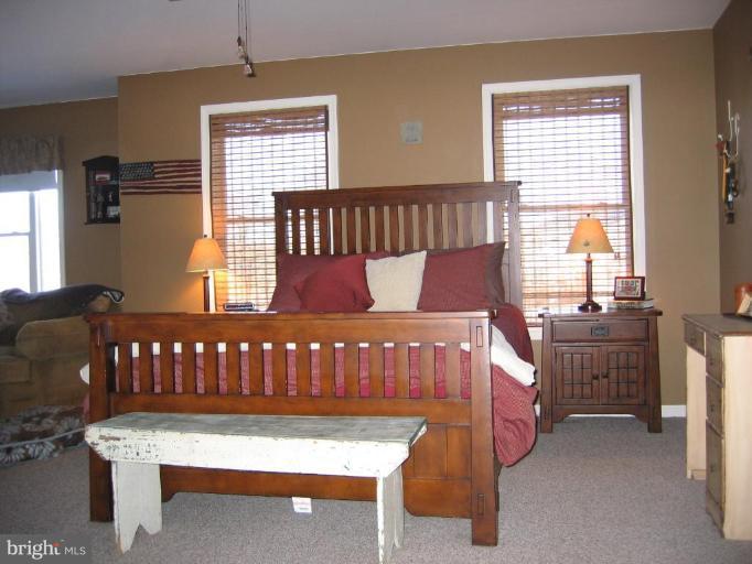 2511 Fairmount Road Hampstead, MD 21074 - Photo 17 of 30 a bedroom with a bed and window