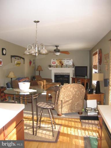 2511 Fairmount Road Hampstead, MD 21074 - Photo 4 of 30 a living room with furniture and a fireplace