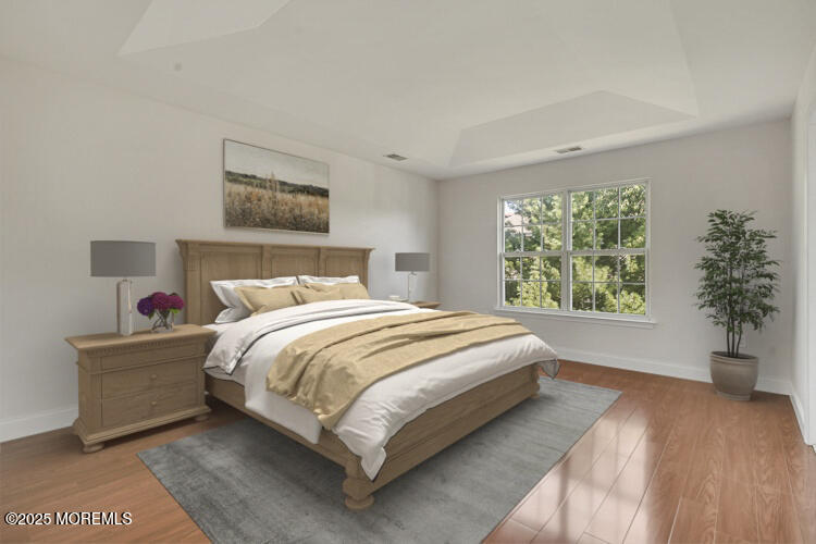 19 Russell Court Matawan, NJ 07747 - Photo 15 of 29 a bedroom with a large bed and a window