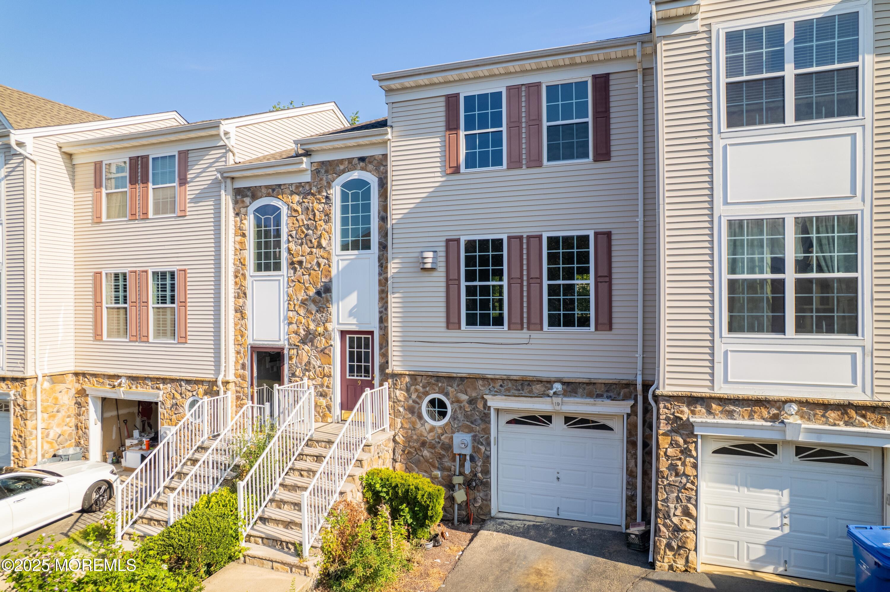 19 Russell Court Matawan, NJ 07747 - Photo 2 of 29 a front view of a house with a yard