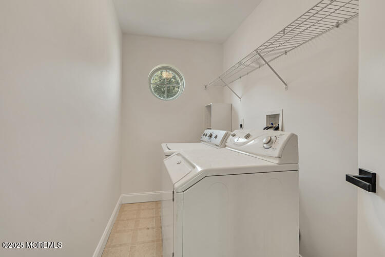 19 Russell Court Matawan, NJ 07747 - Photo 21 of 29 a utility room with dryer and washer