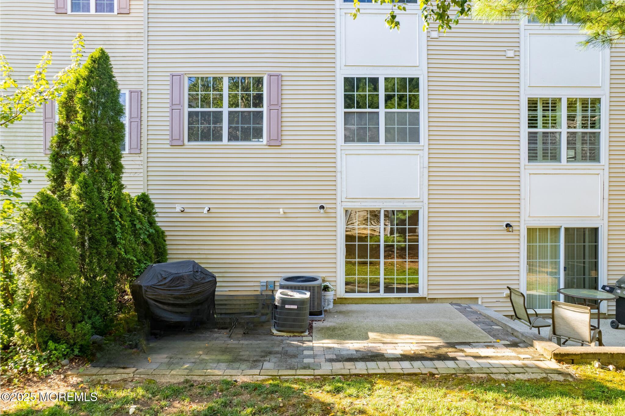 19 Russell Court Matawan, NJ 07747 - Photo 22 of 29 a view of a house with pool in the backyard