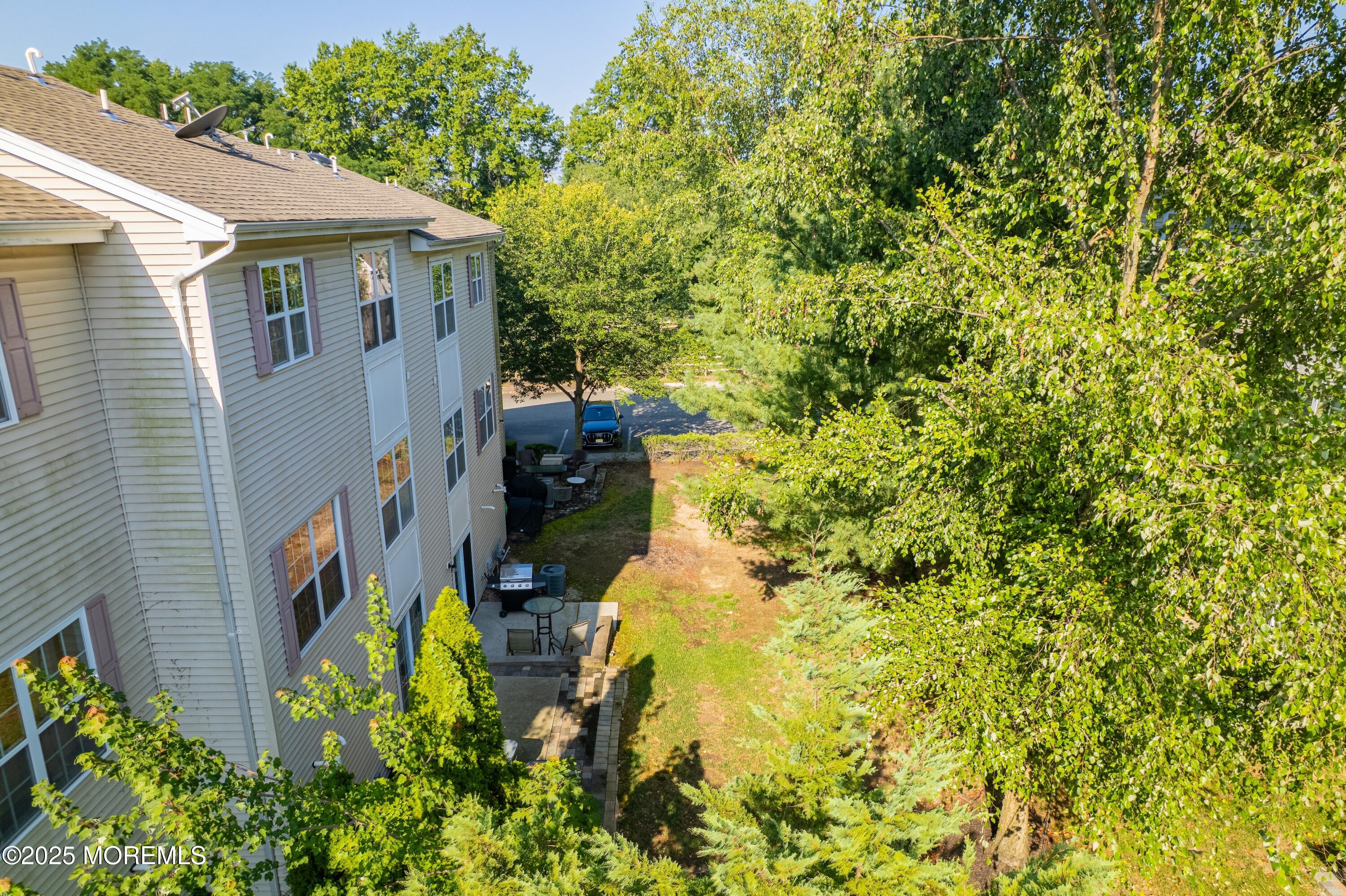 19 Russell Court Matawan, NJ 07747 - Photo 23 of 29 a view of a back yard of the house