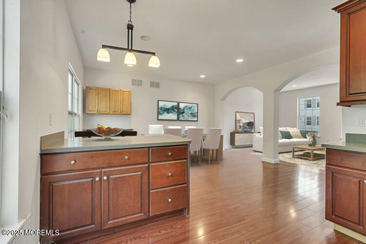 19 Russell Court Matawan, NJ 07747 - Photo 10 of 29 a living room with furniture and a flat screen tv