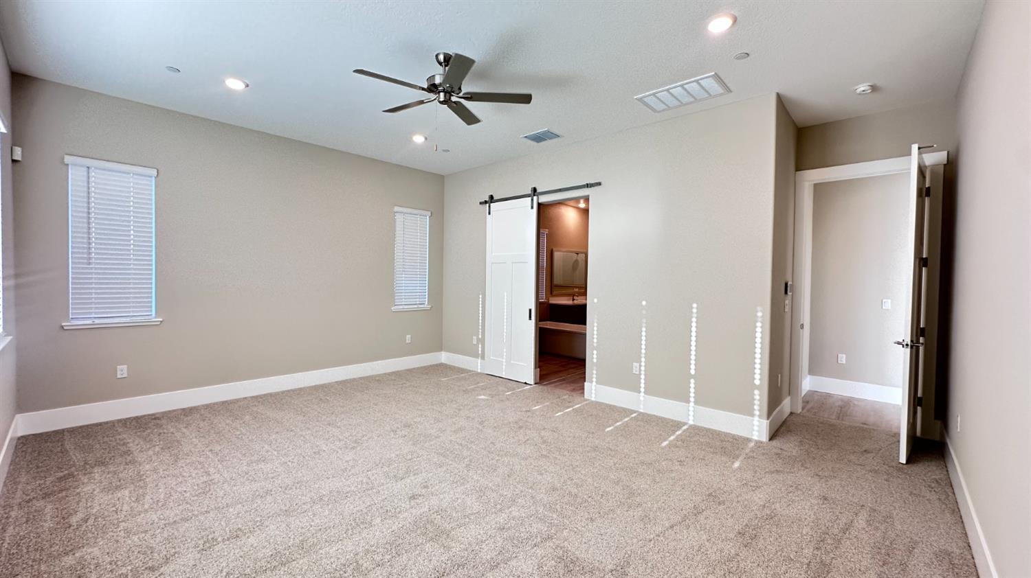 3036 Pocosol Way Rancho Cordova, CA 95742 - Photo 11 of 14 an empty room with closet and a ceiling fan