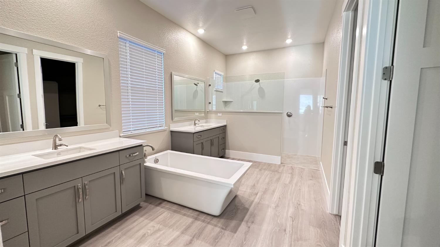 3036 Pocosol Way Rancho Cordova, CA 95742 - Photo 12 of 14 a bathroom with a granite countertop sink mirror and double