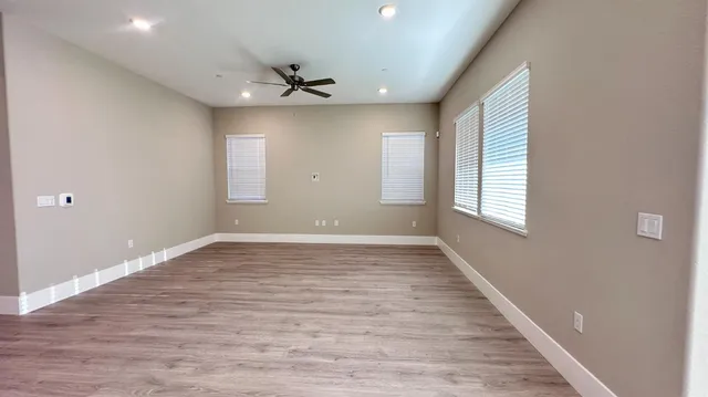 a view of an empty room and window