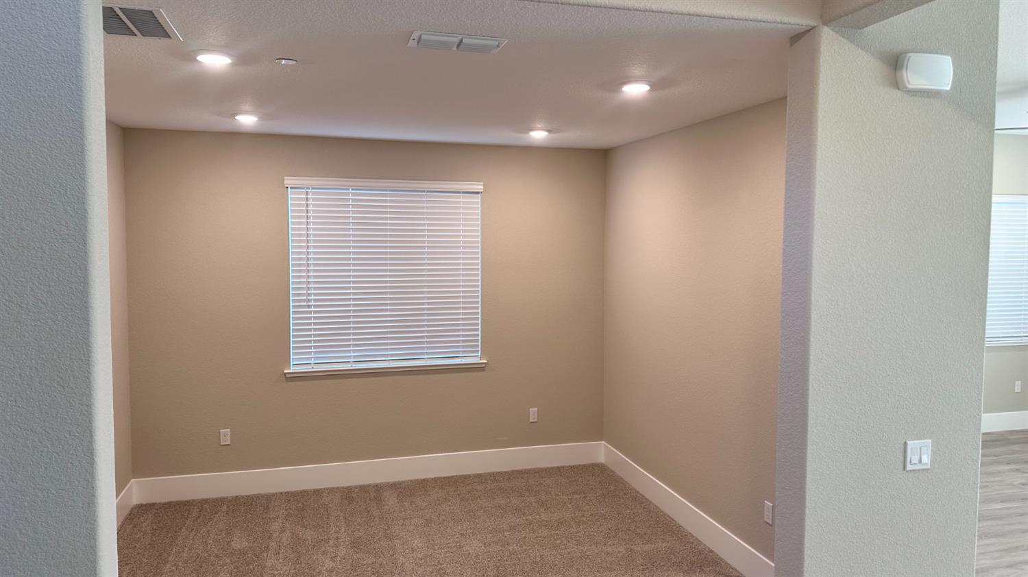 3036 Pocosol Way Rancho Cordova, CA 95742 - Photo 2 of 14 a view of an empty room with a window