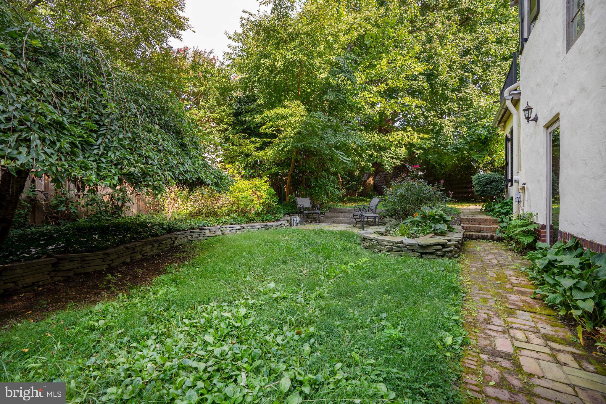 726 Nottingham Road Wilmington, DE 19805 - Photo 21 of 67 Side yard with brick walkway
