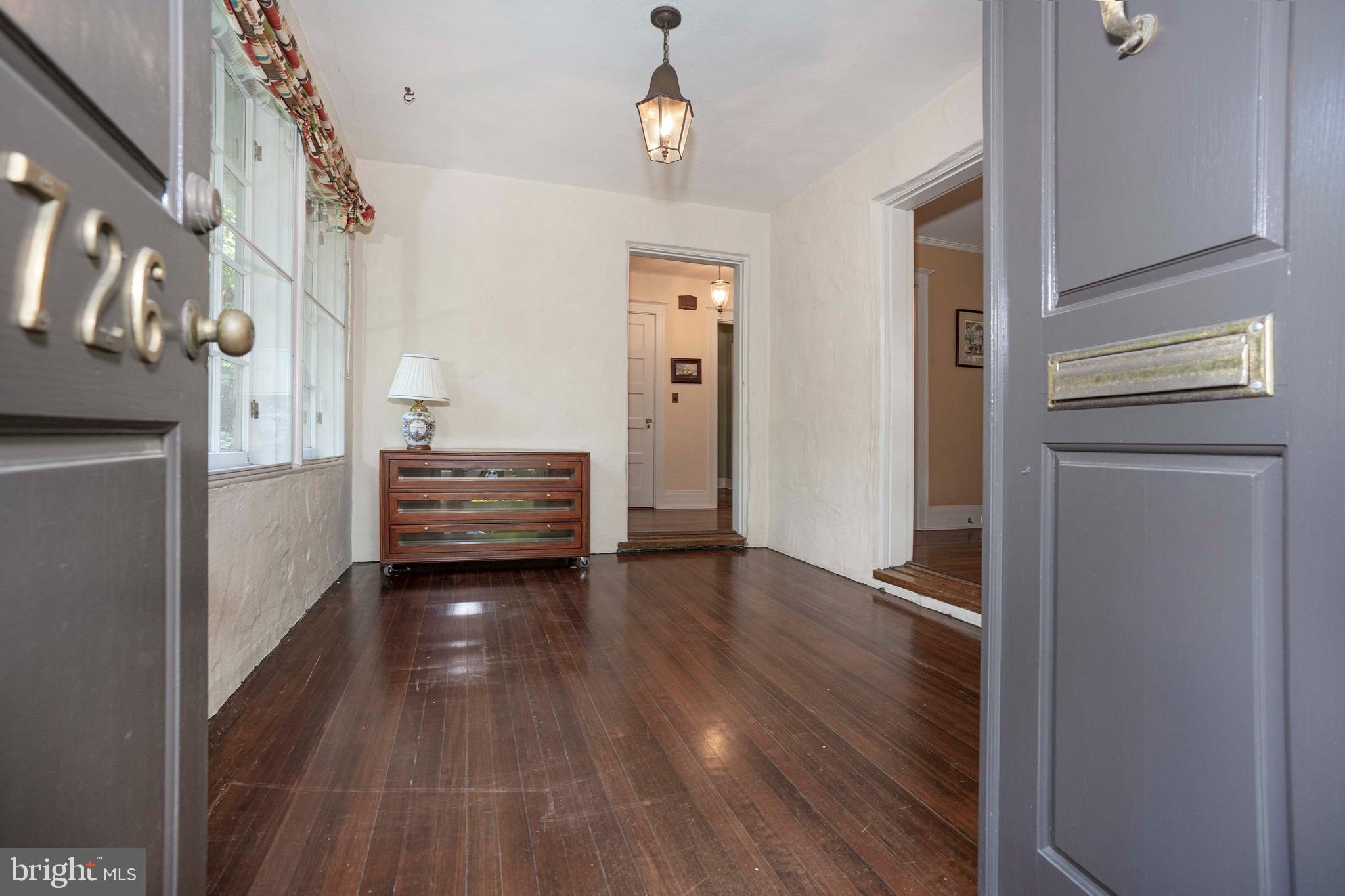 726 Nottingham Road Wilmington, DE 19805 - Photo 27 of 67 Front hallway with beautiful hardwood flooring