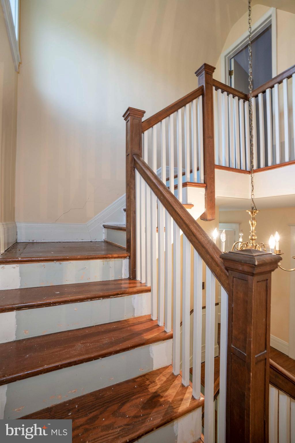 726 Nottingham Road Wilmington, DE 19805 - Photo 36 of 67 Stairs to second floor with oak and wood spindles