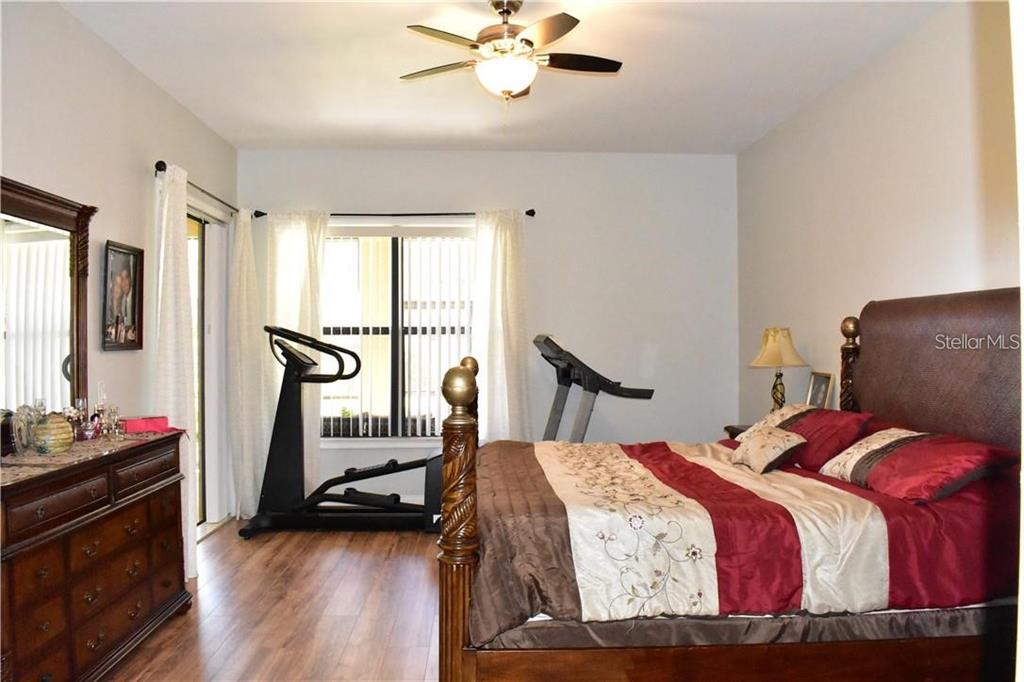 20104 Pond Spring Way Tampa, FL 33647 - Photo 19 of 51 a bedroom with a bed and a window