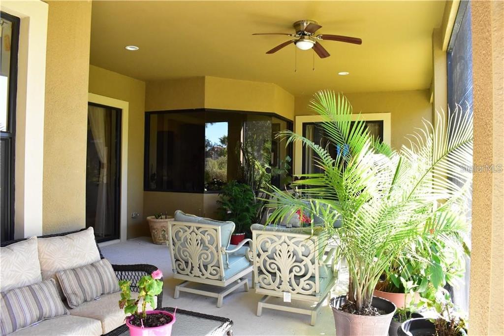 20104 Pond Spring Way Tampa, FL 33647 - Photo 30 of 51 a living room with furniture