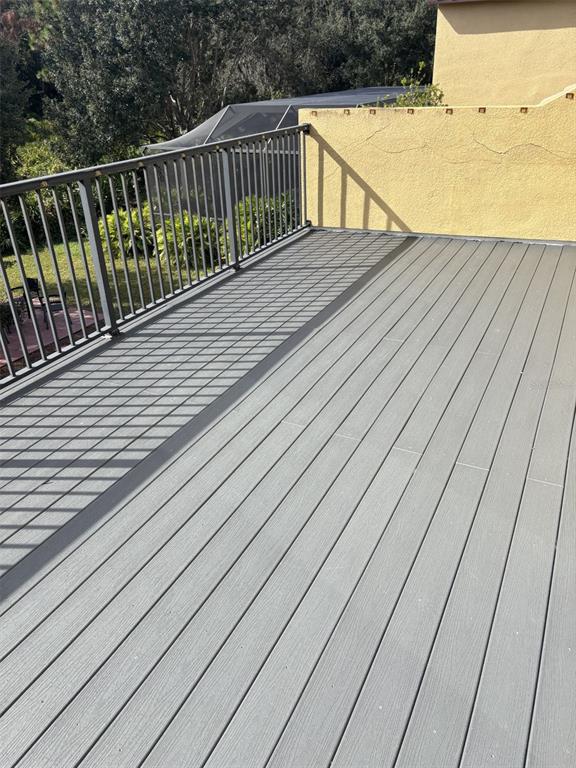20104 Pond Spring Way Tampa, FL 33647 - Photo 34 of 51 a view of balcony with wooden floor