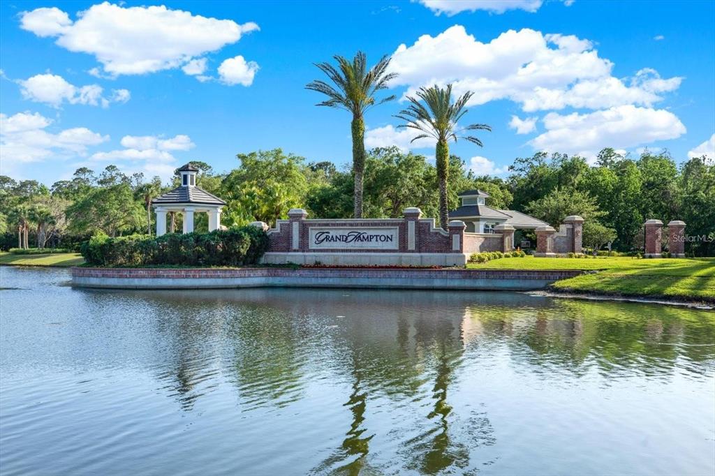 20104 Pond Spring Way Tampa, FL 33647 - Photo 37 of 51 a view of a lake with houses