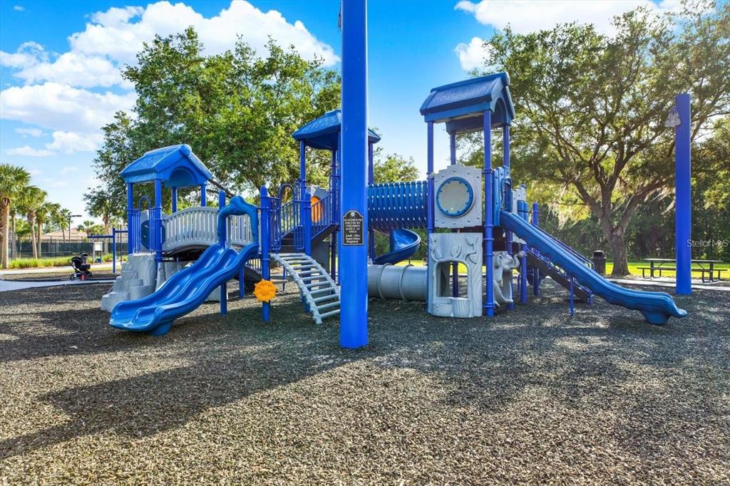 20104 Pond Spring Way Tampa, FL 33647 - Photo 44 of 51 a view of outdoor space with playground and green space