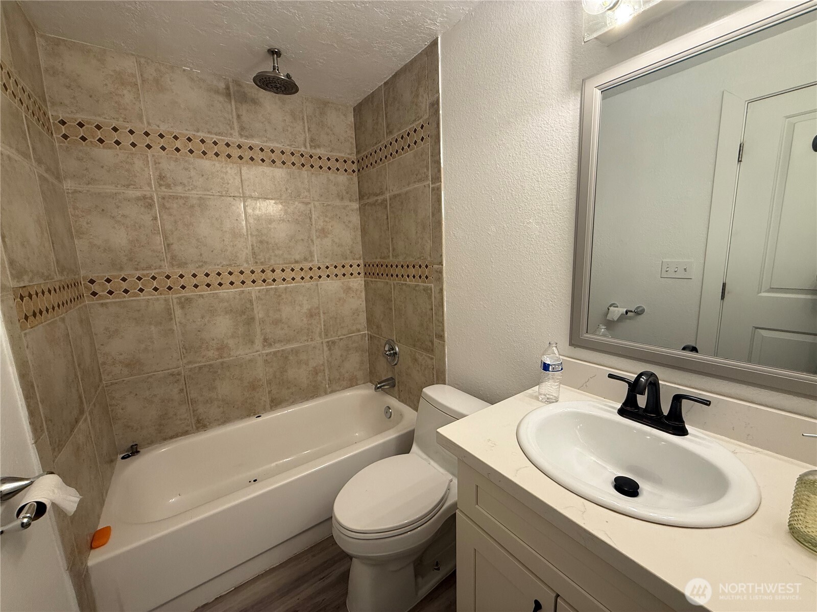 14600 Southeast 176th Street, Unit A3 Renton, WA 98058 - Photo 6 of 7 a bathroom with a sink toilet and shower