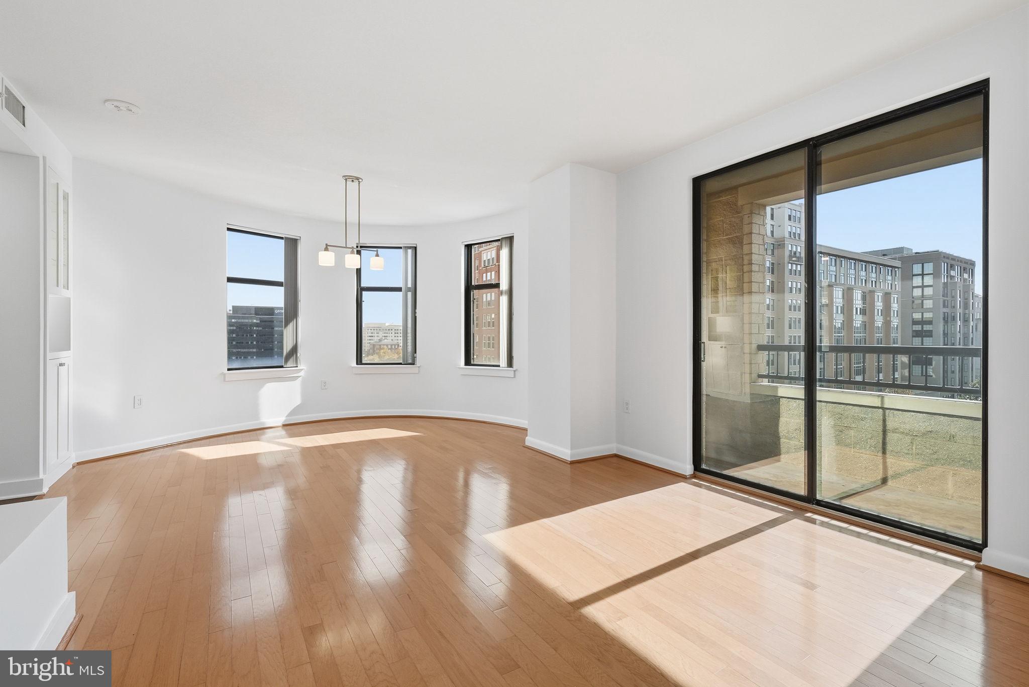 400 Massachusetts Avenue Northwest, Unit 719 Washington, DC 20001 - Photo 9 of 38 a view of an empty room with window