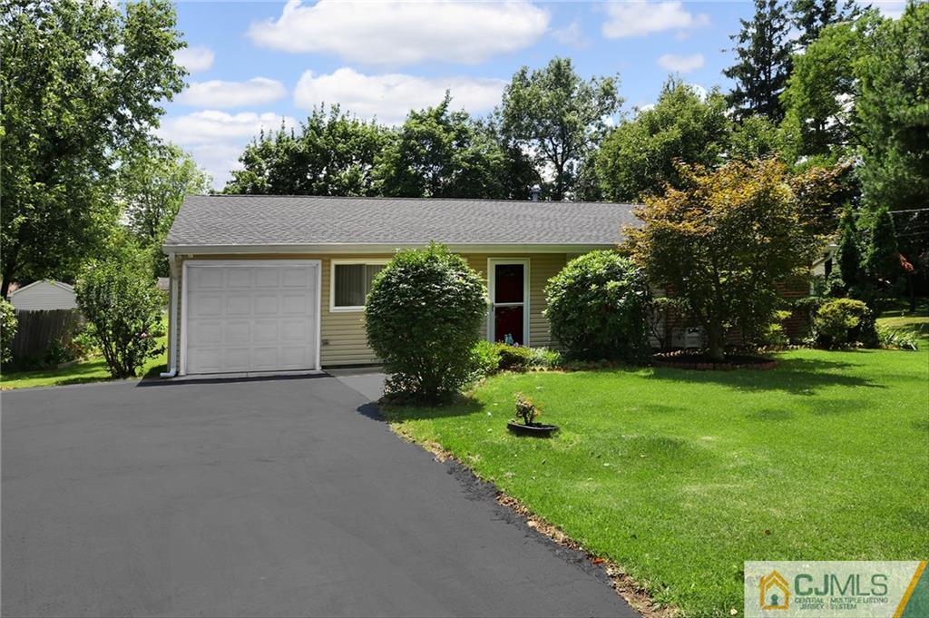 16 Joline Road Kendall Park, NJ 08824 - Photo 2 of 23 a view of a house with a yard and tree s