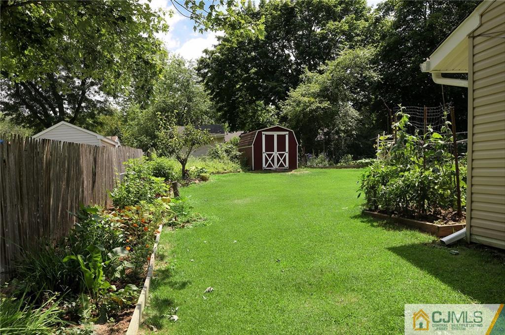 16 Joline Road Kendall Park, NJ 08824 - Photo 20 of 23 a view of a back yard