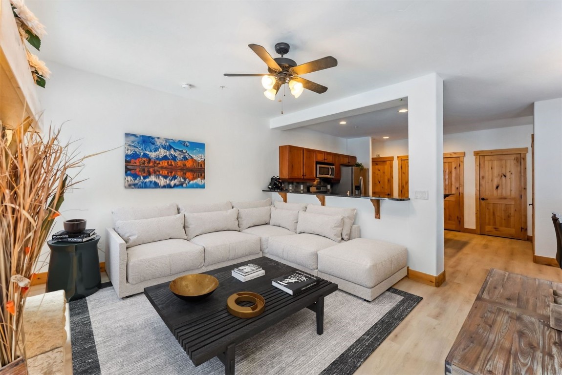 35 Tip Top Trail, Unit 6500 Keystone, CO 80435 - Photo 2 of 47 a living room with furniture a rug and a flat screen tv