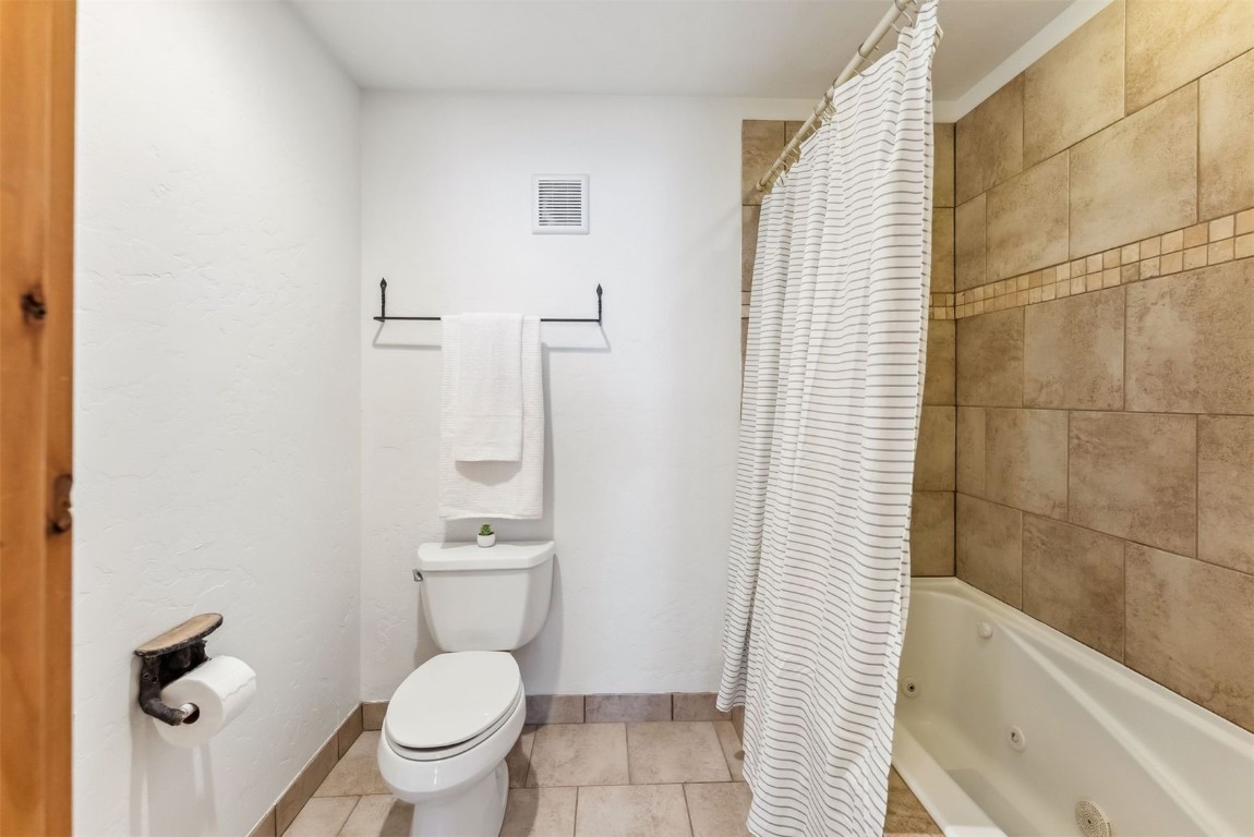 35 Tip Top Trail, Unit 6500 Keystone, CO 80435 - Photo 22 of 47 a bathroom with a toilet and a shower