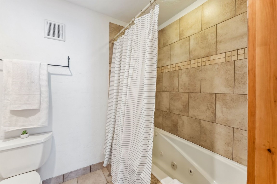 35 Tip Top Trail, Unit 6500 Keystone, CO 80435 - Photo 23 of 47 a bathroom with a shower and a toilet