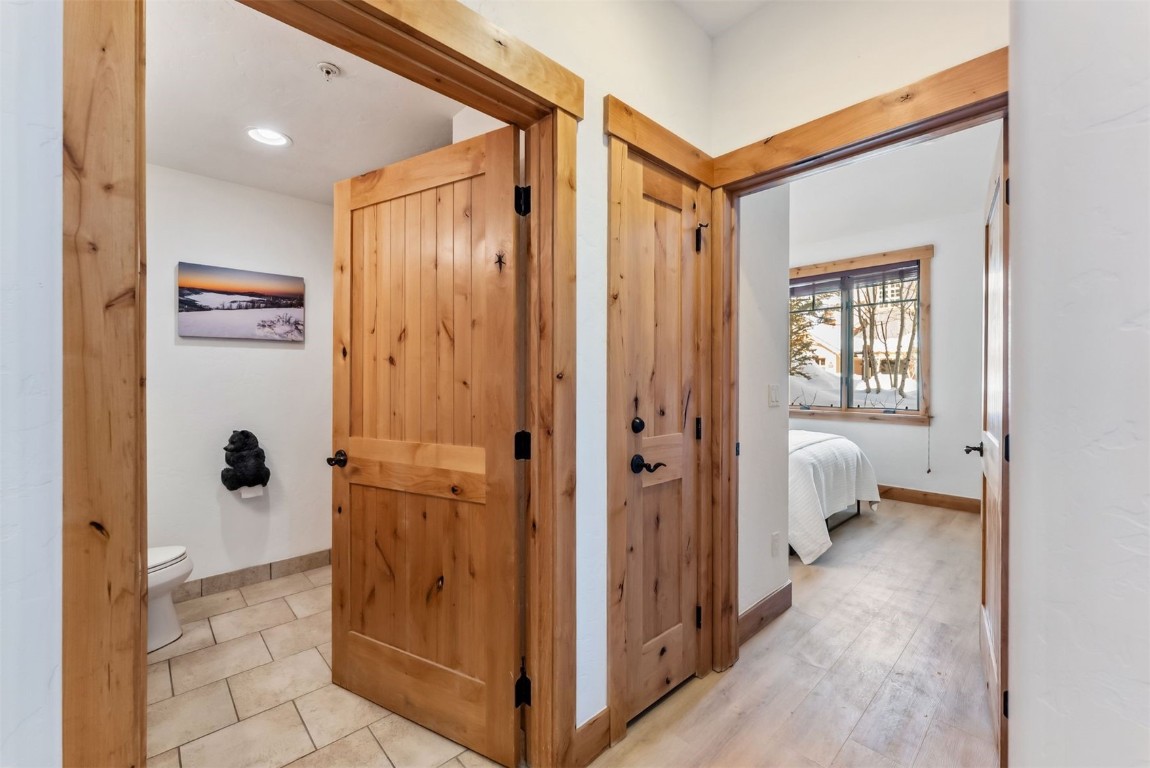 35 Tip Top Trail, Unit 6500 Keystone, CO 80435 - Photo 30 of 47 a view of a bathroom with a glass door shower