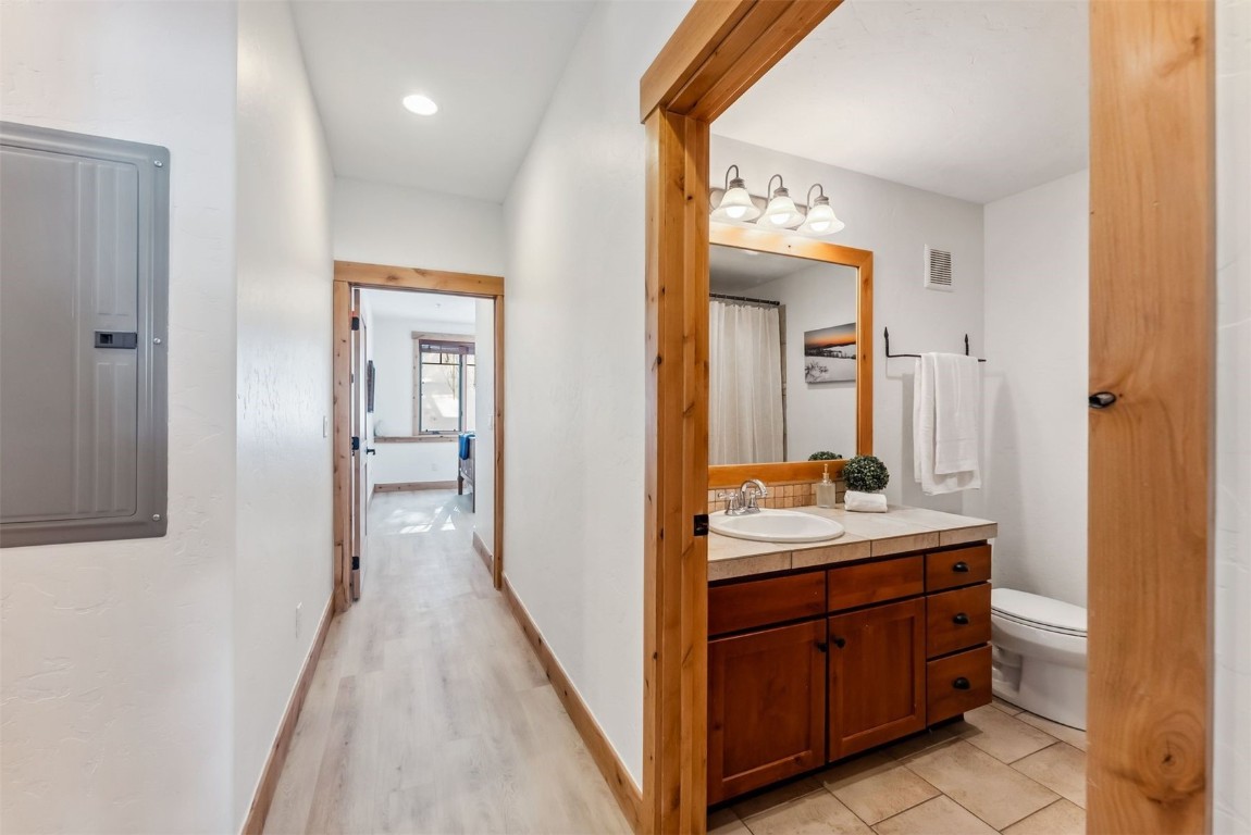 35 Tip Top Trail, Unit 6500 Keystone, CO 80435 - Photo 31 of 47 a en suite bathroom with a sink and a mirror