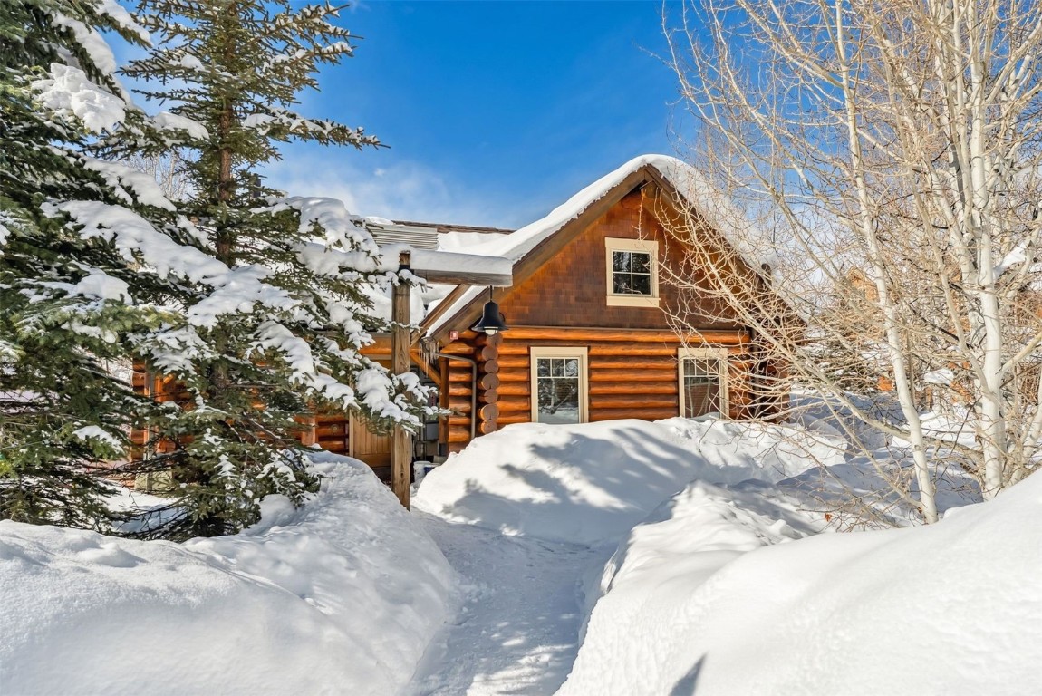 35 Tip Top Trail, Unit 6500 Keystone, CO 80435 - Photo 38 of 47 a view of a house with a yard