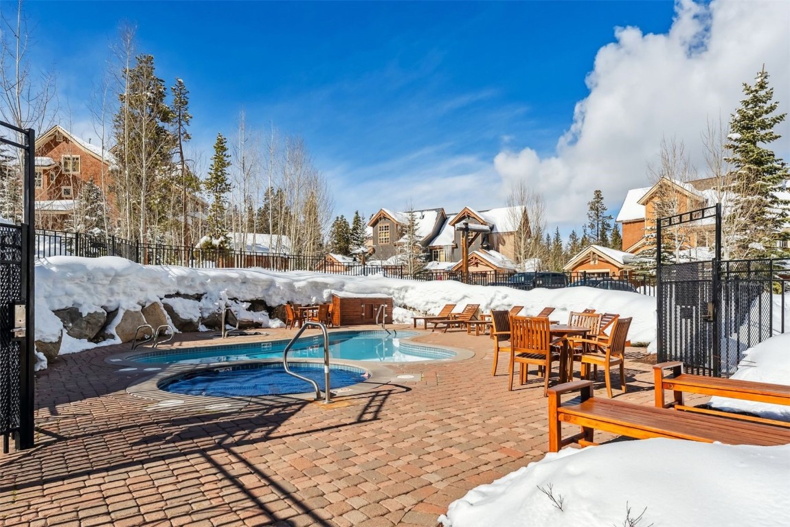 35 Tip Top Trail, Unit 6500 Keystone, CO 80435 - Photo 44 of 47 a view of a swimming pool with outdoor seating