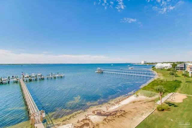 a view of a swimming pool with an ocean view