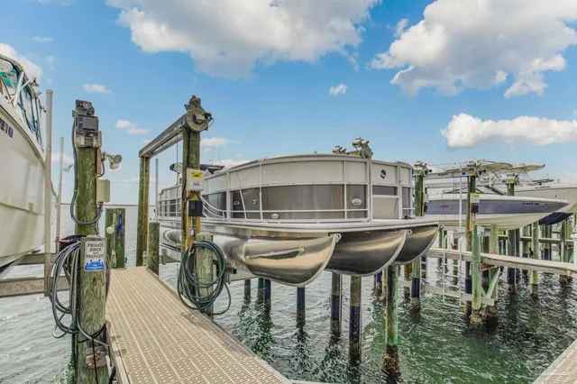 a front view of a house with sitting area
