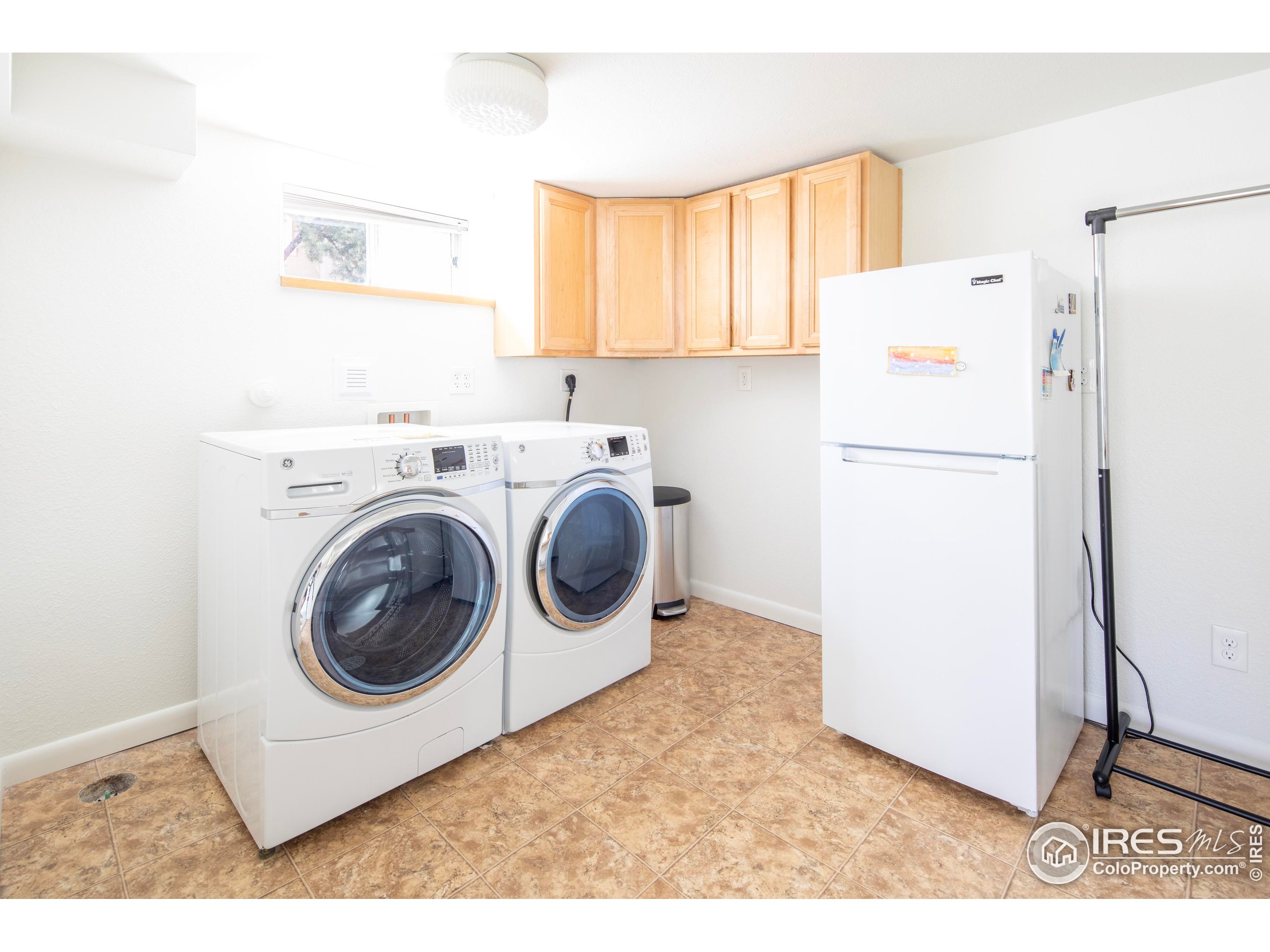 2447 20th Street Boulder, CO 80304 - Photo 16 of 35 a utility room with dryer and washer