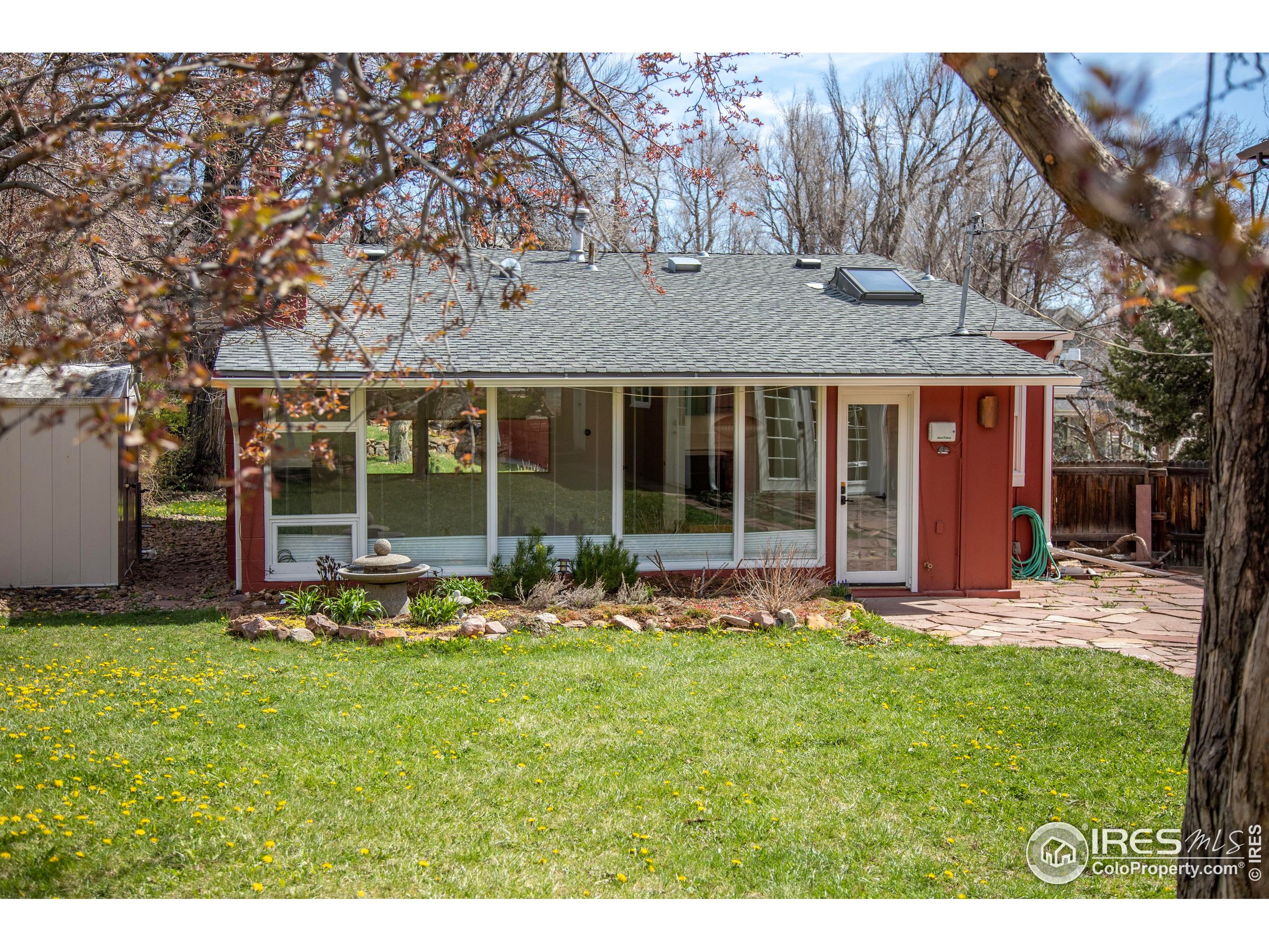 2447 20th Street Boulder, CO 80304 - Photo 33 of 35 a view of a house with backyard and sitting area