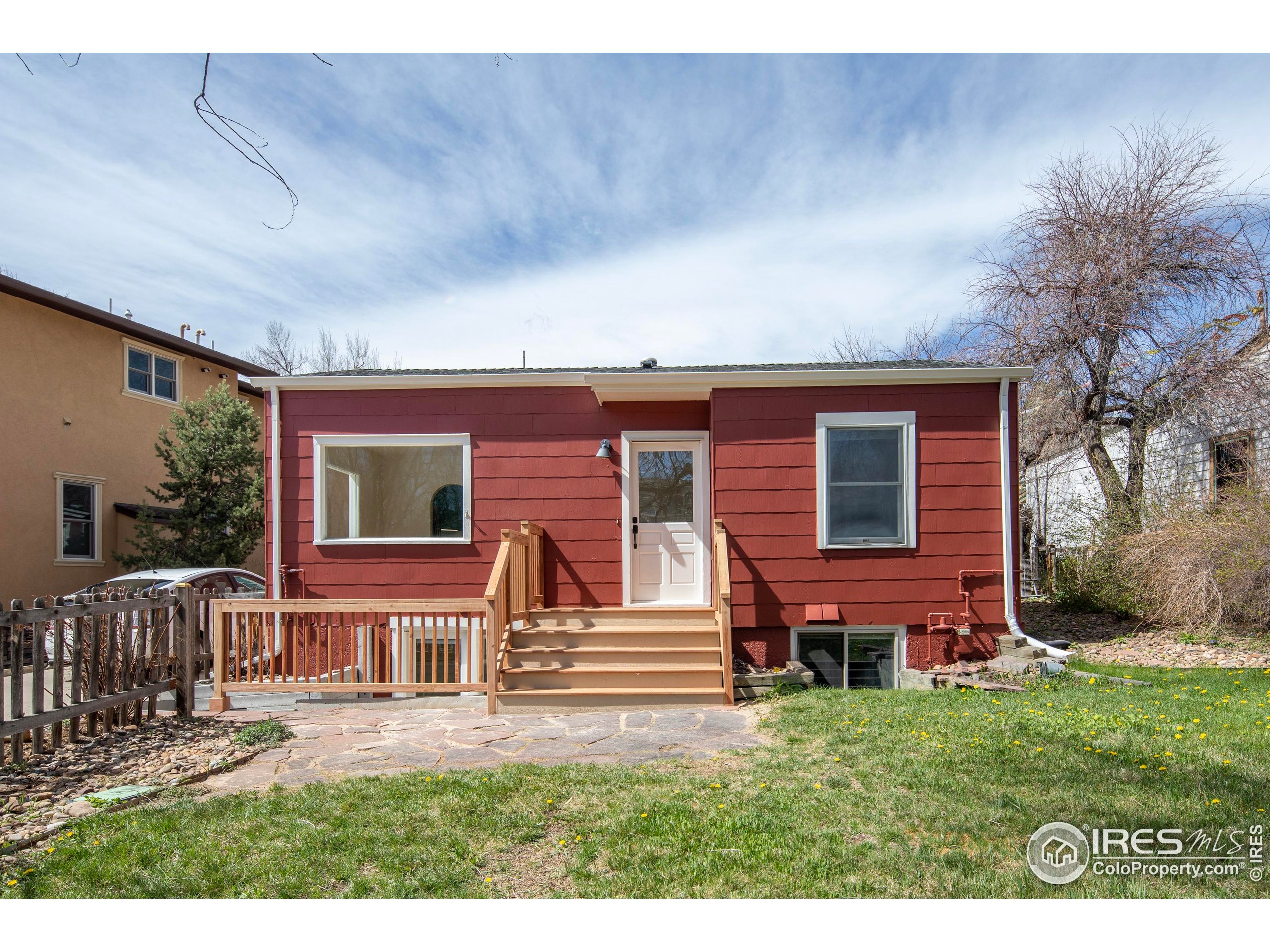2447 20th Street Boulder, CO 80304 - Photo 34 of 35 a backyard of a house with barbeque oven and outdoor seating