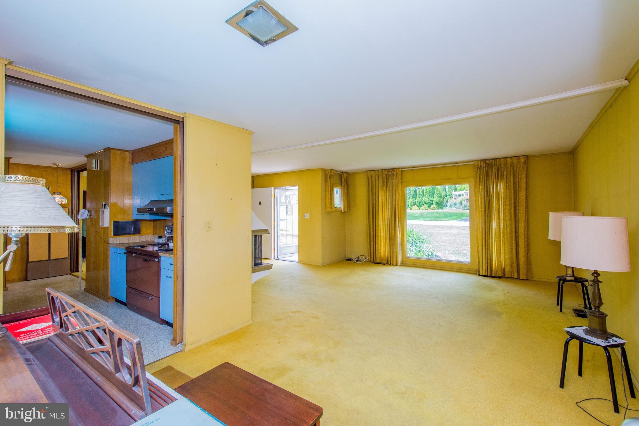 3601 Macalpine Road Ellicott City, MD 21042 - Photo 8 of 29 a view of an empty room with furniture and a window