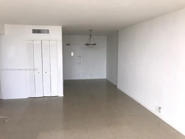 an empty room with a door