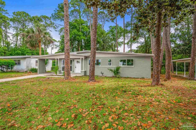 front view of a house with a big yard