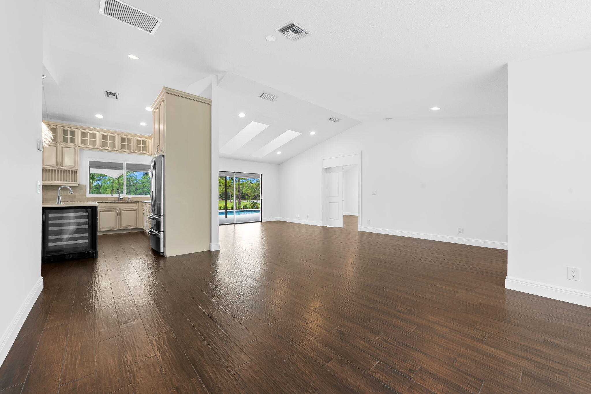 5635 Reynolds Road Lake Worth, FL 33449 - Photo 15 of 40 a view of a livingroom with furniture wooden floor and a rug