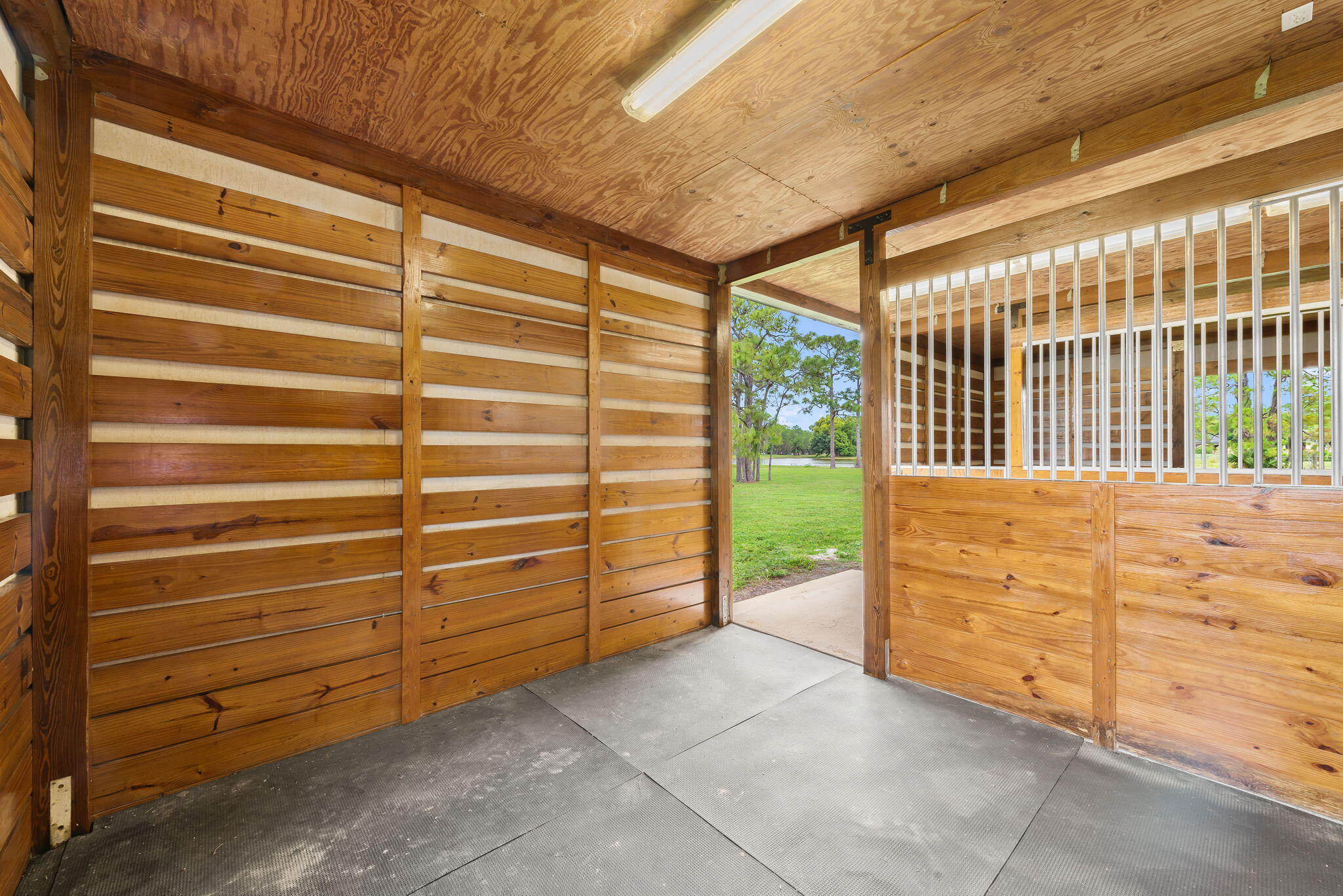5635 Reynolds Road Lake Worth, FL 33449 - Photo 35 of 40 a view of walk in closet with clothes and shoes