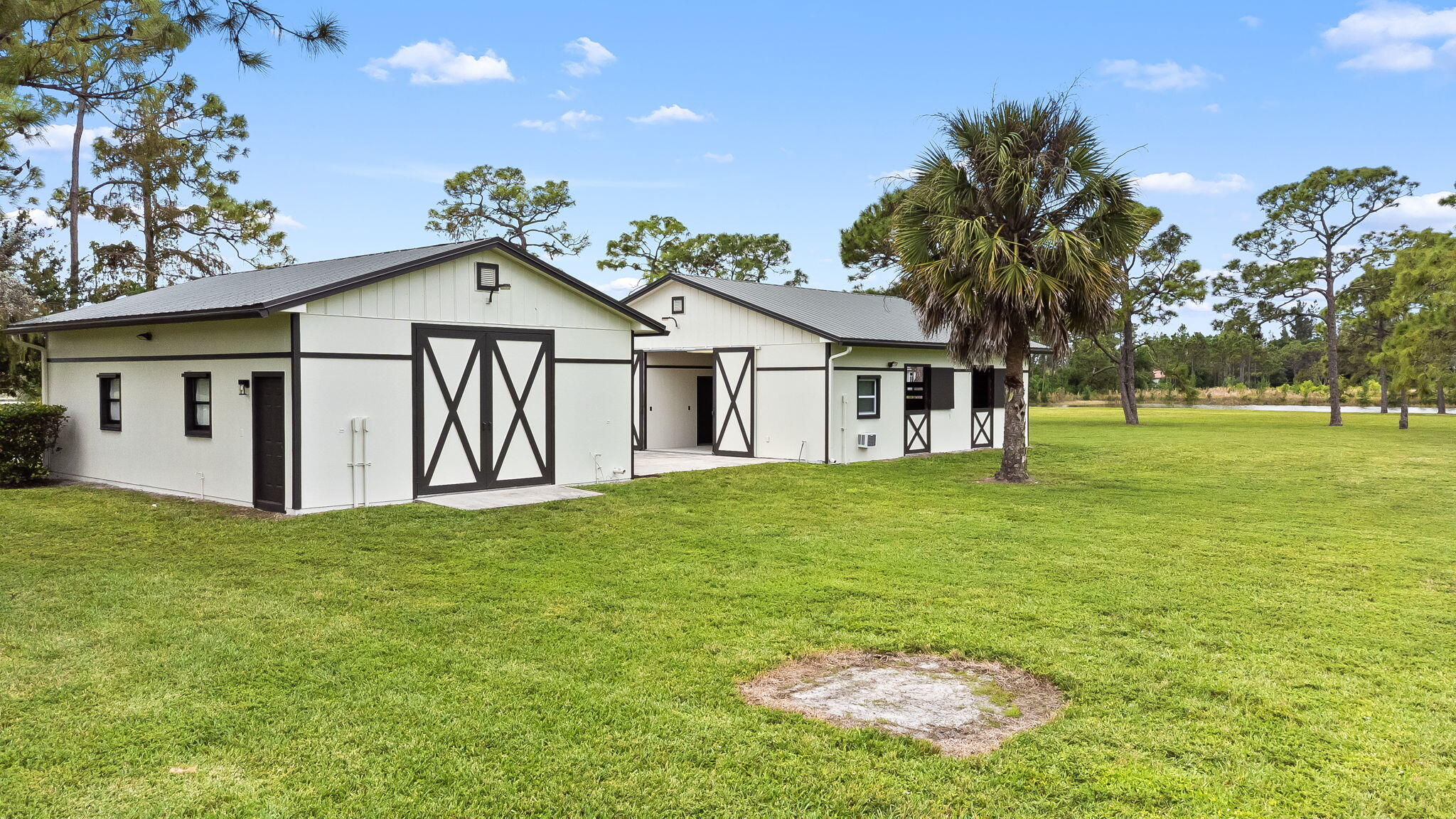 5635 Reynolds Road Lake Worth, FL 33449 - Photo 37 of 40 a view of a house with a outdoor space