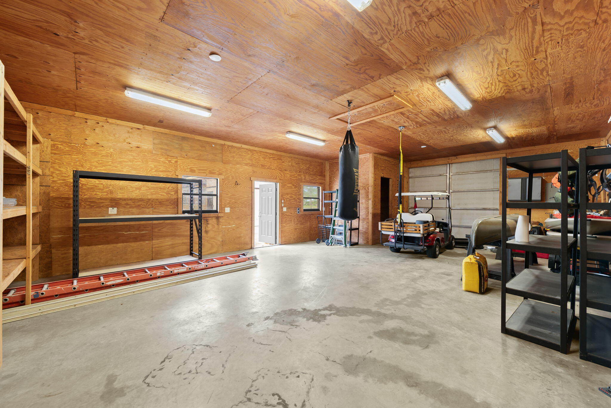 5635 Reynolds Road Lake Worth, FL 33449 - Photo 38 of 40 a view of a garage with furniture