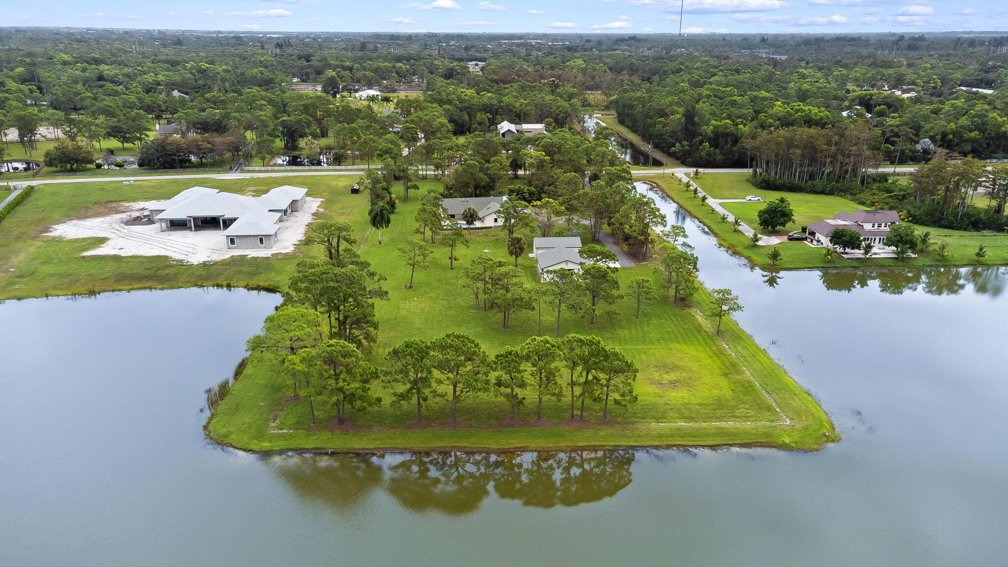 5635 Reynolds Road Lake Worth, FL 33449 - Photo 40 of 40 an aerial view of a house with a yard