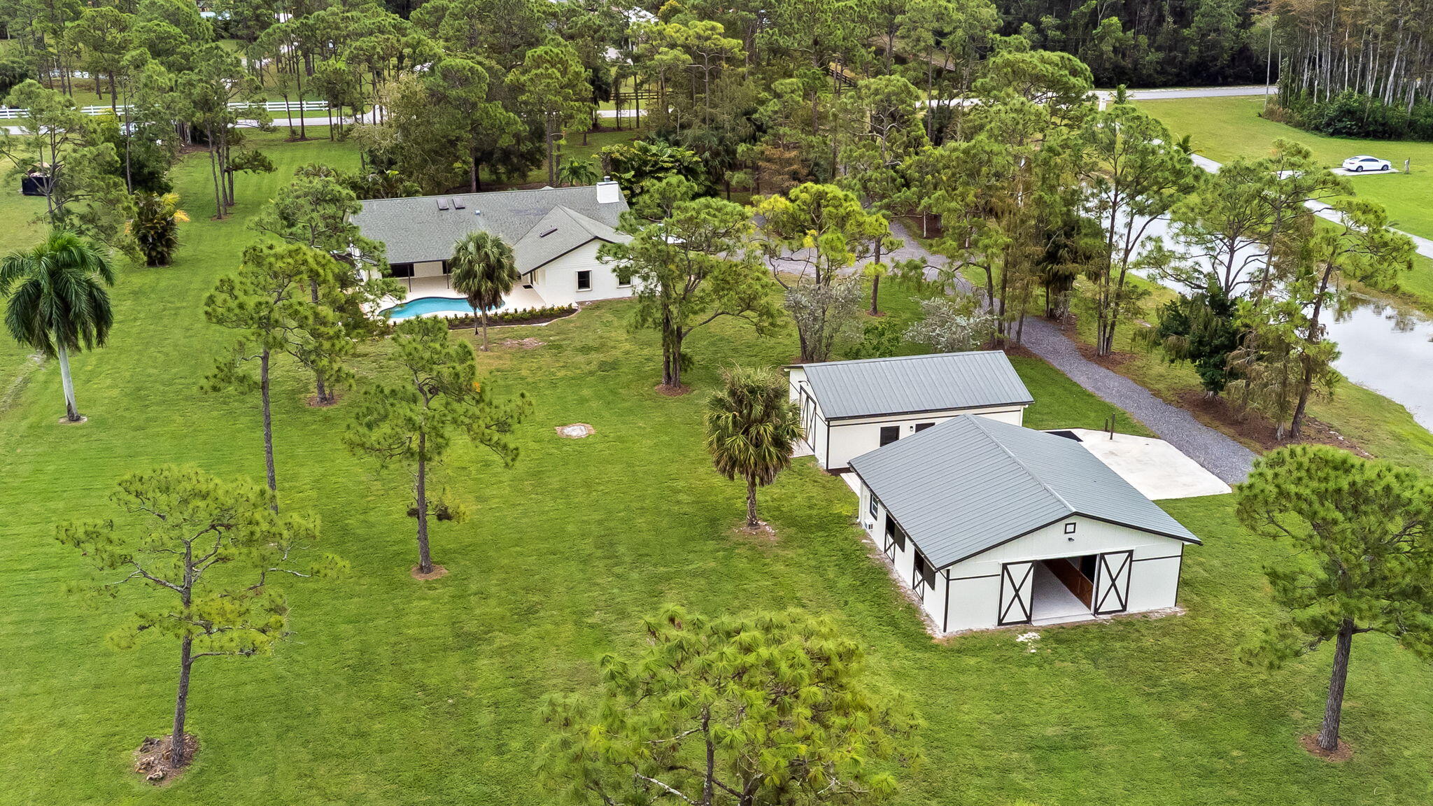 5635 Reynolds Road Lake Worth, FL 33449 - Photo 7 of 40 an aerial view of a house with a yard